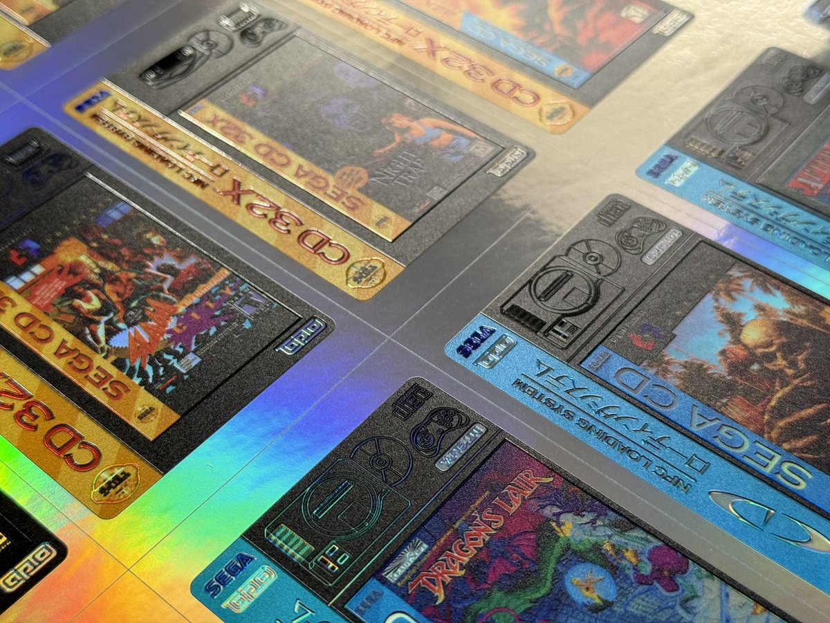 ArielAces's tweet image. These colors are just too pretty! #Holo3DFX #TapTo/#Zaparoo full decal set now available for #Sega32X, #SegaCD, and #SegaCD32X
