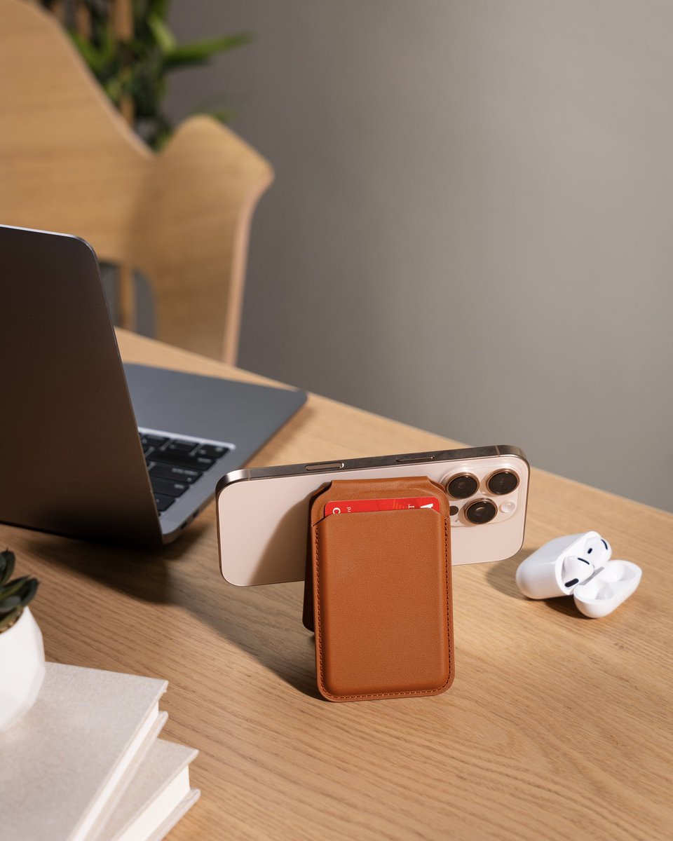 Swipe to switch 📱👉 Transform your wallet into a sturdy phone stand. Are you using portrait or landscape mode? ⬇️
