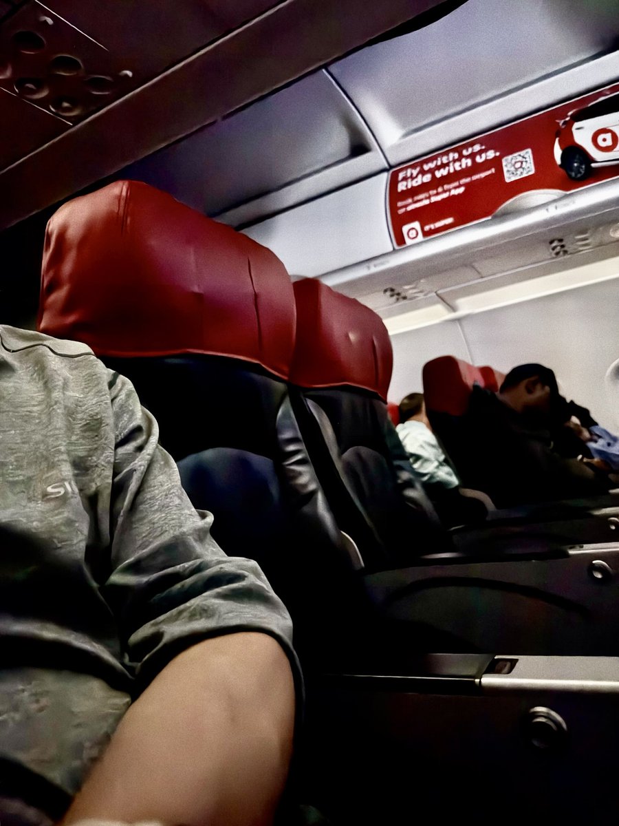 Is it just me being tired or the seats are a bit more vertical in AirAsia planes? This is a hot seat by the way.