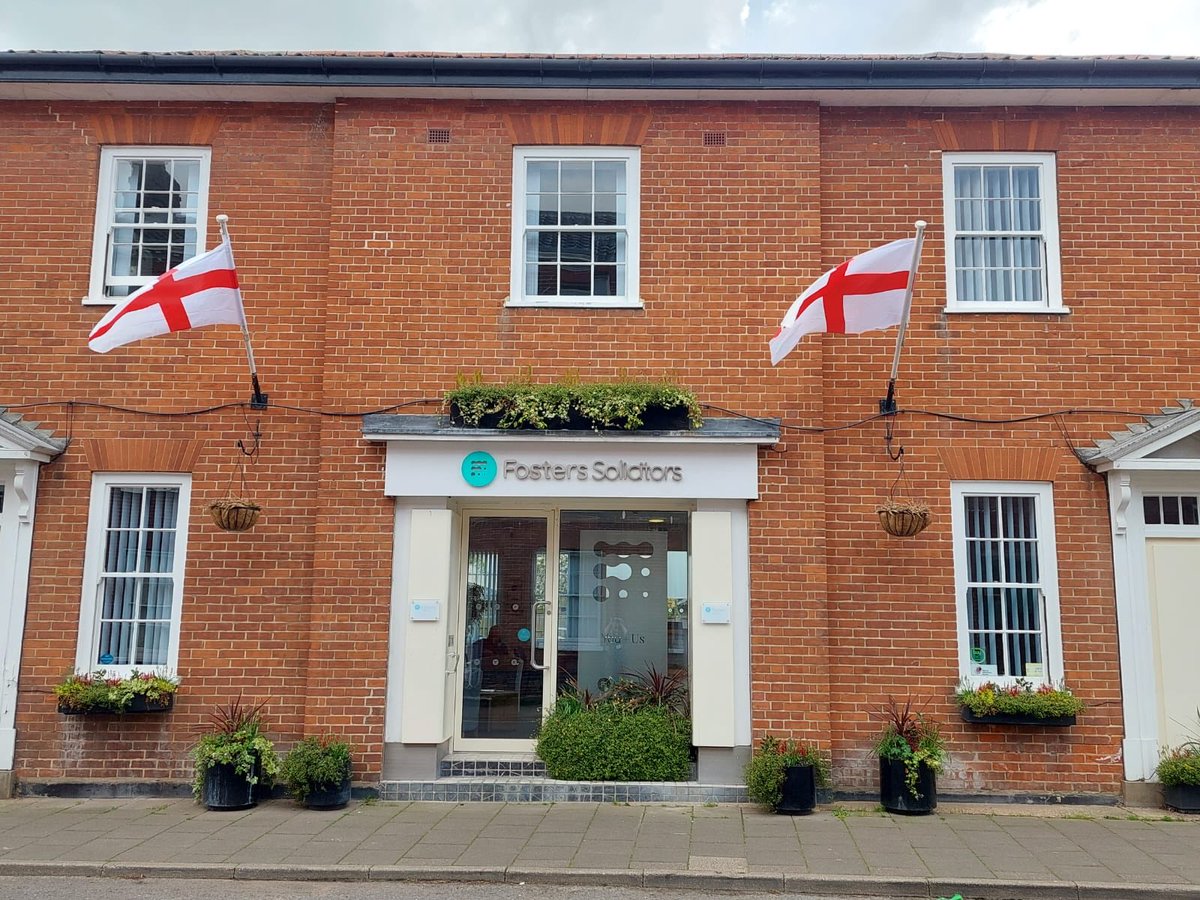 Fosters_PI's tweet photo. The flags are out at our Wymondham office as we join in the town wide commemoration of England’s patron saint ⁦@FostersSol⁩. Happy St George’s Day. #SaintGeorge https://t.co/KGVa6yYyDA