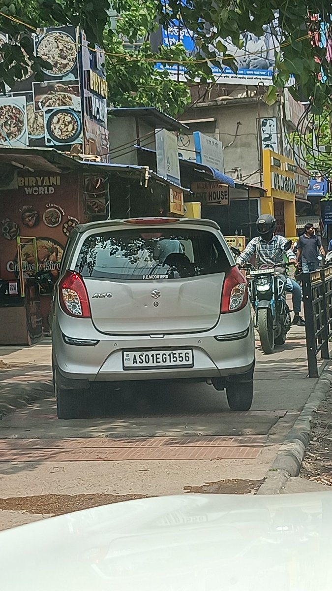 aolraj18's tweet photo. @GuwahatiPol @gpsinghips @himantabiswa @DGPAssamPolice @CMOfficeAssam since when footpaths in Guwahati have been allotted for parking? Location - Christian Basti, Sreenagar Police Point. https://t.co/Ykk8Y90ade