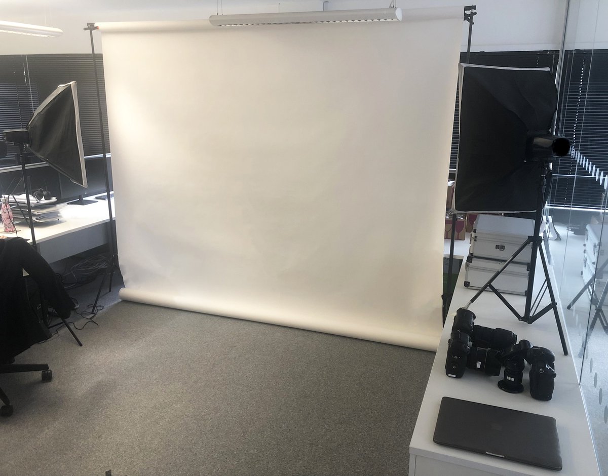 Our mobile studio, carefully erected within a client's office space, so that we could do team and business portraits, with a pure white background.  Ideal for presentations, brochures, company website, even LinkedIn!  

When did your company last update your portraits?