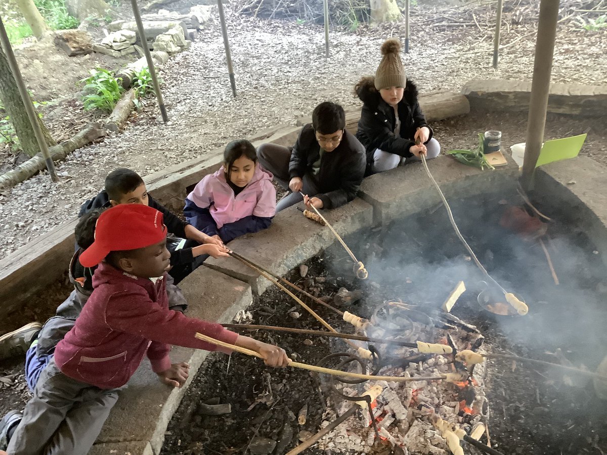 Making garlic bread with hot chocolate