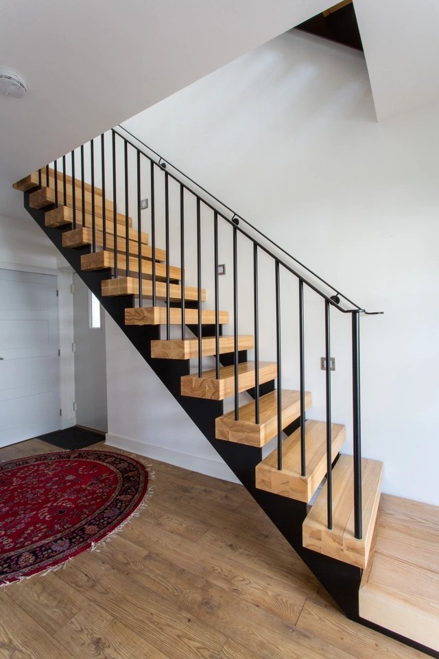 We produced a #staircase that ran across two flights for the Neve #property which includes a simple metal balustrade with plain round spindles, thick Grade-A ash treads, and specially profiled steel stringers.

Read more: zurl.co/ir07u