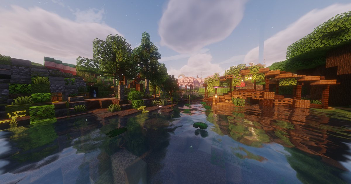 Deep in the dark oak forest.. the nation of Faerun has some of our most talented builders showing off their skill and beautiful builds. 
Taking a stroll here almost helps you to forget the terrors of this magical world!

Almost.