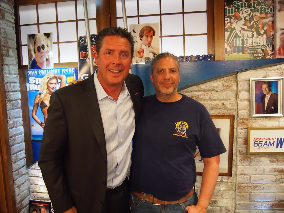 13 years ago Eddie took a pic with Dan Marino