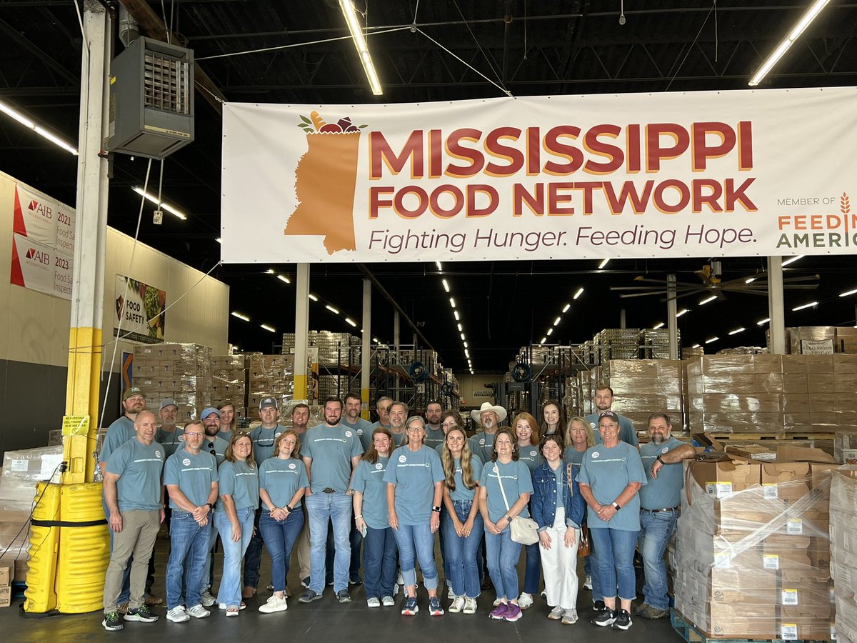 MSFarmBureau's tweet photo. This morning, MFBF staff rolled up their sleeves and volunteered at the Mississippi Food Network, packing food for the Backpack Program to help fight childhood hunger. We’re proud to support this important effort. #FarmerFeedingTheHungry #MississippiNeedsFarmers https://t.co/JeRCU06pLX