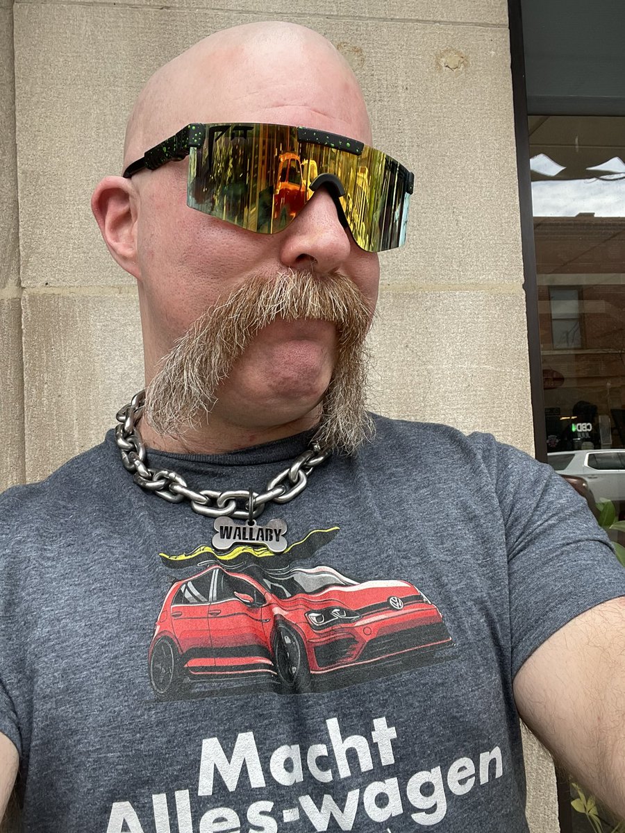 Got Tidied up by the Barber down the street. Mo a little short but will grow back. Barber Visit Makes Wallaby a Happy Pup. #mo #mustache #shavedhead #Bald