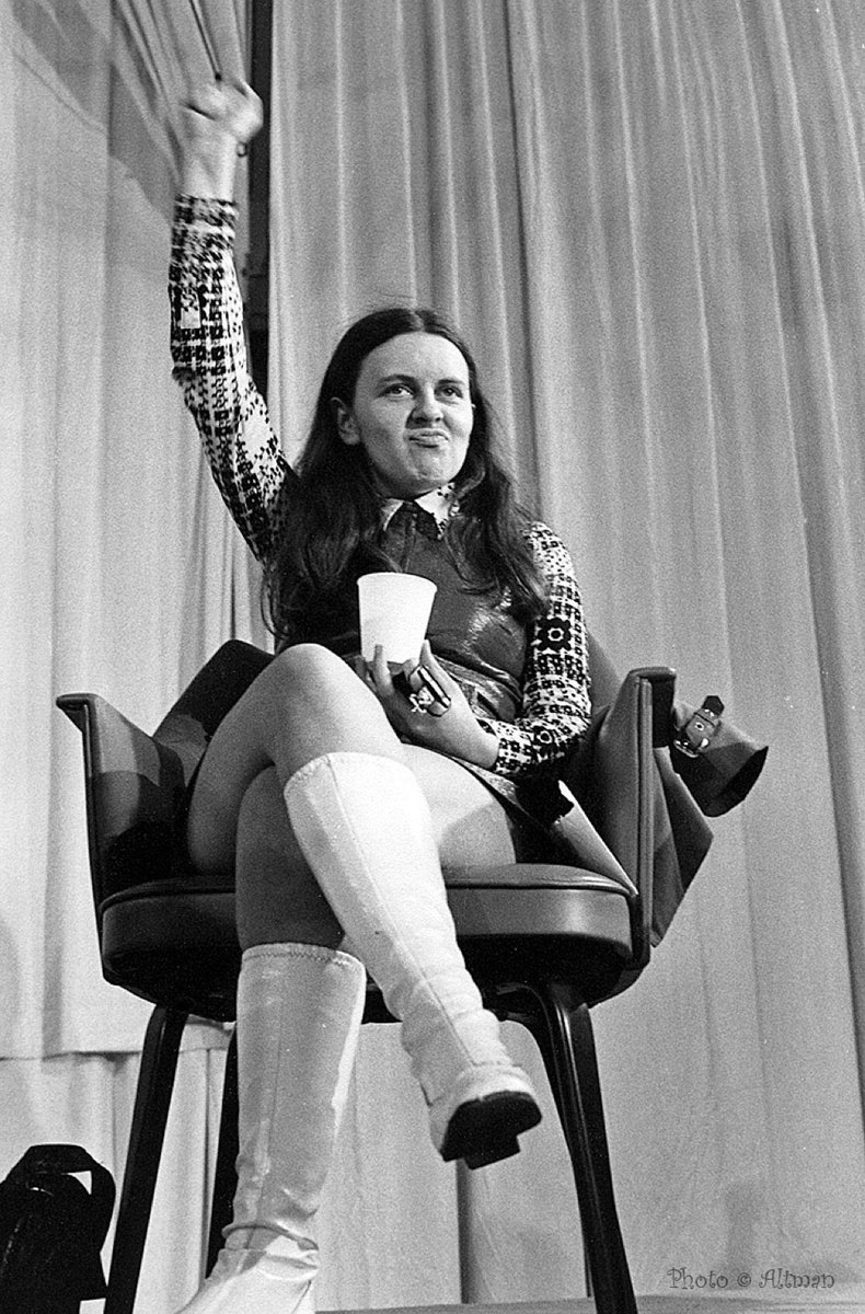 Bernadette Devlin McAliskey with her closed fist in the air 
