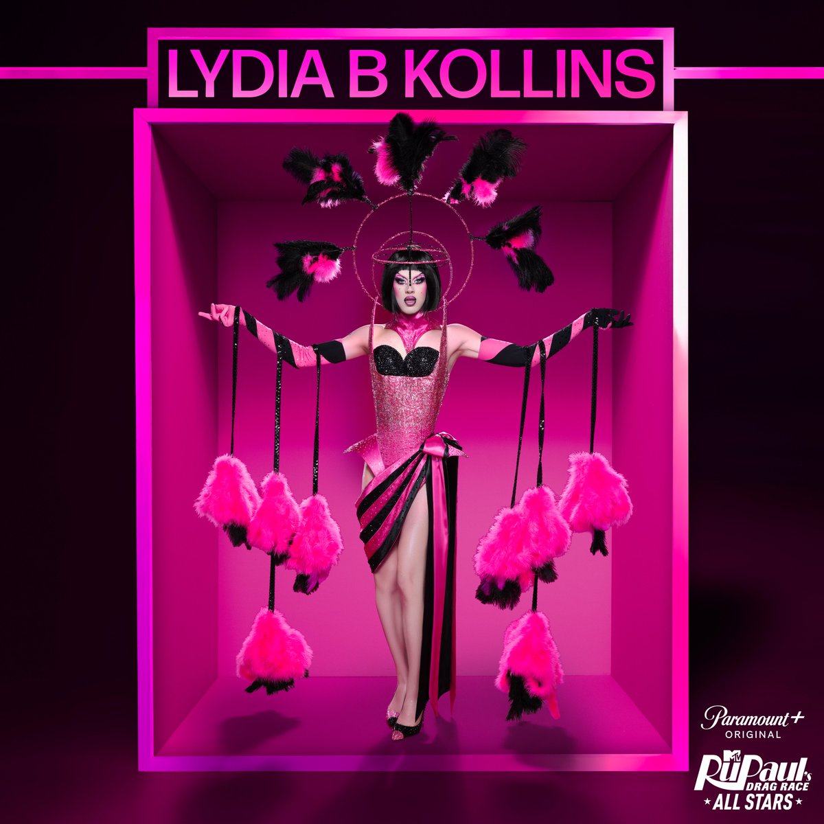 RuPaulsDragRace's tweet photo. One in the pink! 🤭 @lydiabkollins is back for #AllStars10 – streaming MAY 9 on @paramountplus! 💗 https://t.co/VGE3XvIs7A