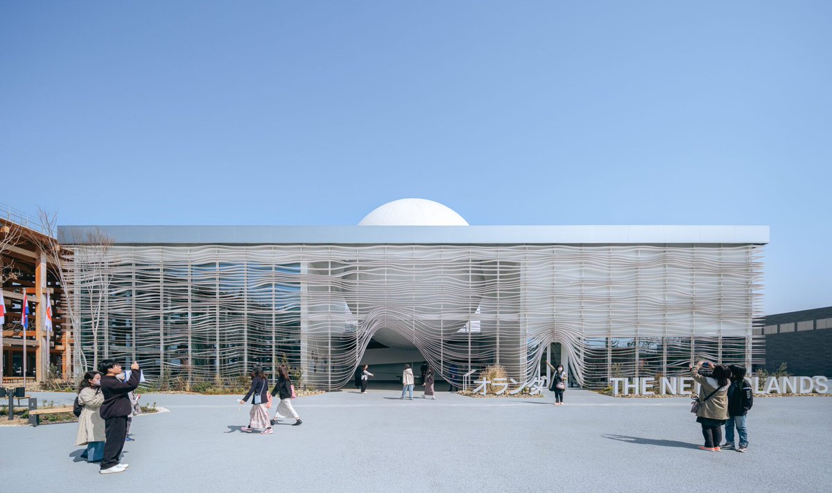 designboom's tweet photo. giant luminous sphere emerges from white layered netherlands pavilion at expo 2025 osaka https://t.co/Mz8piZwdm4 https://t.co/BTSYgi2gxq