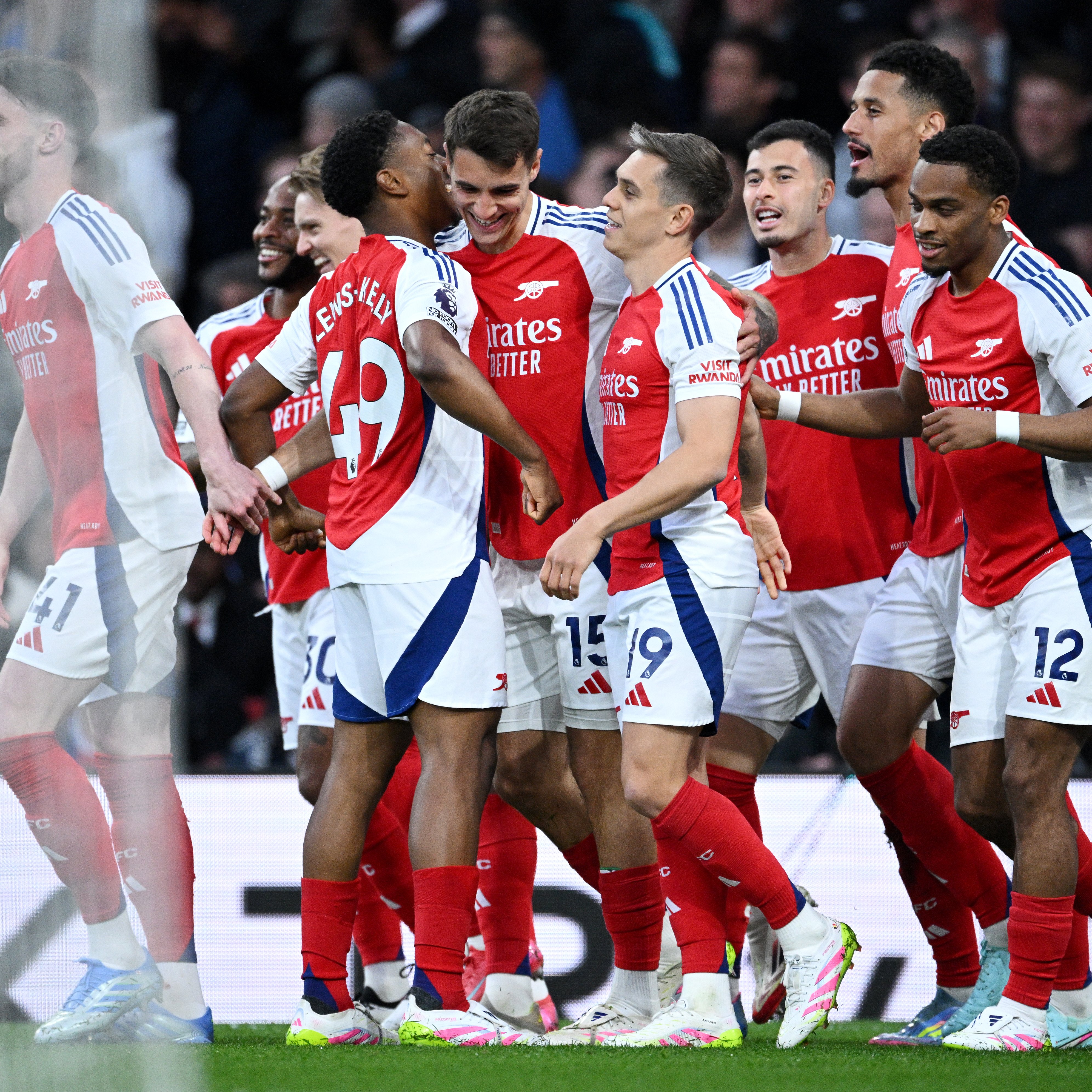 Jakub Kiwior celebrates with his team-mates.