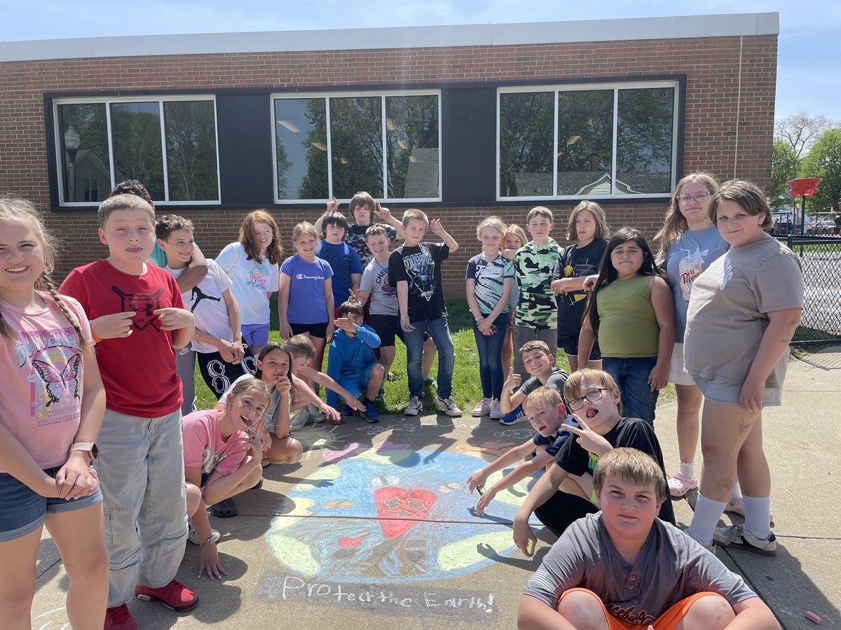 Beautiful day to celebrate Earth Week! Students are hard at work creating their sidewalk masterpieces!