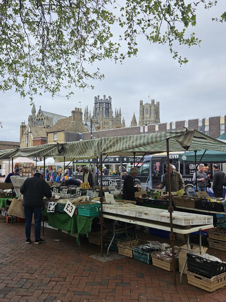 Ely Market right now. When I was a child, Thursday was the big day in Ely, market day, the buses bringing in the shoppers from out in the Fens. Most of the regular stallholders knew my granny, and knew better than to offer her vegetables, fruit or fish that weren't their best!