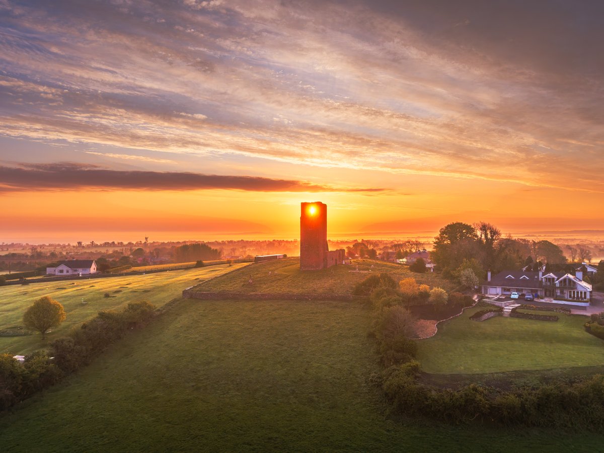 Sunrise through the Skryne tower. #meath #ireland #sunrise