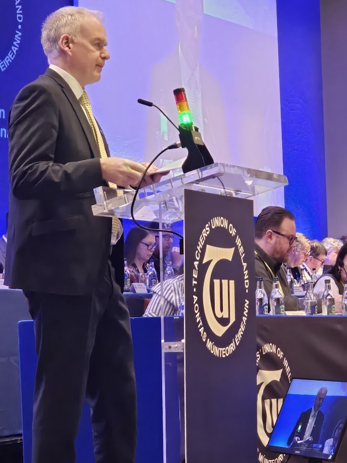 Justin McCamphill, ICTU President, addresses #tui25. We need to show solidarity to all marginalised groups and stand up against misogyny. He quotes Nelson Mandela: "Education is the most powerful weapon which you can use to change the world."