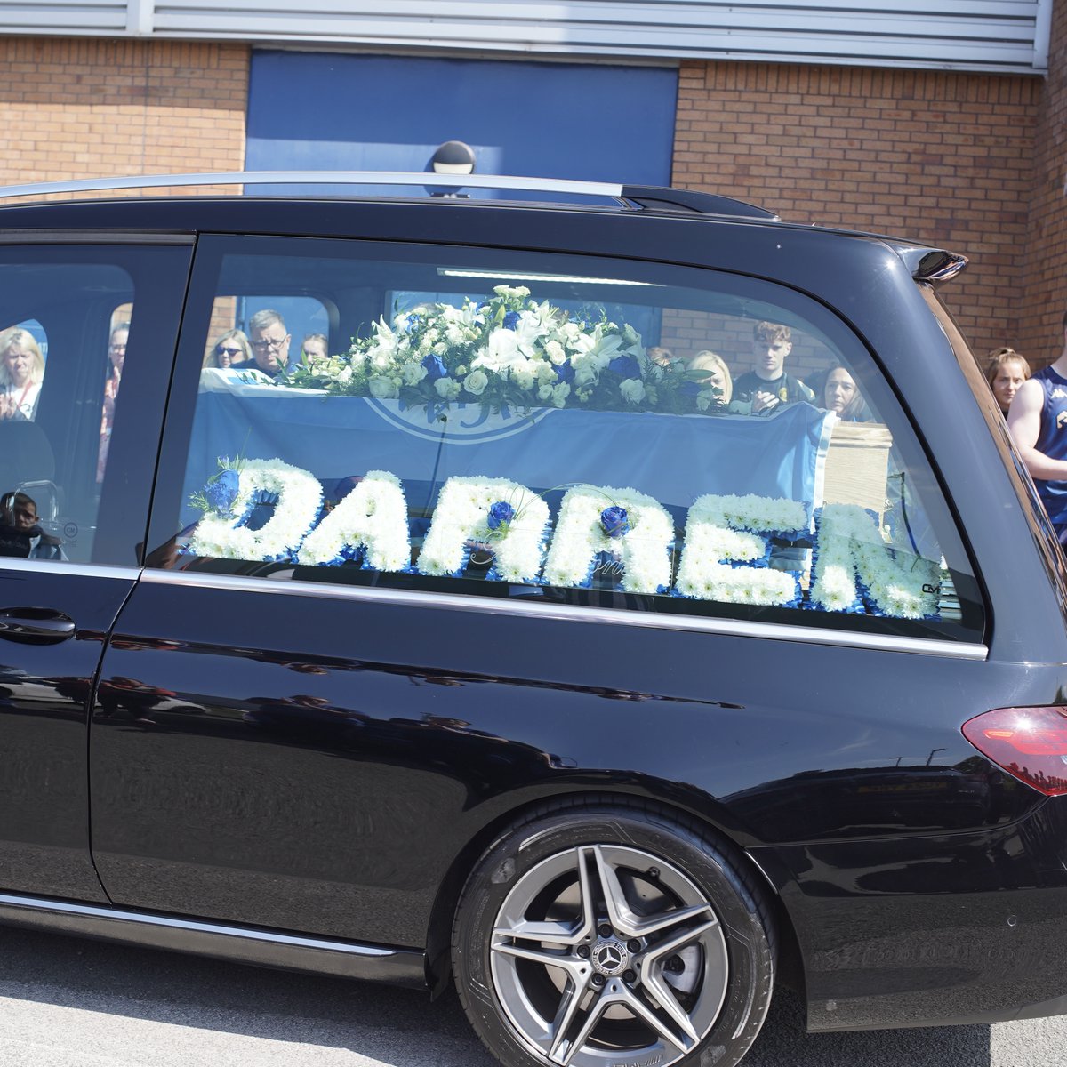 The Wigan community came together this afternoon to say goodbye to one of our own. 

R.I.P Darren - a true Tics mon who will always be remembered by everyone in our town. 💙

#wafc 🔵⚪️