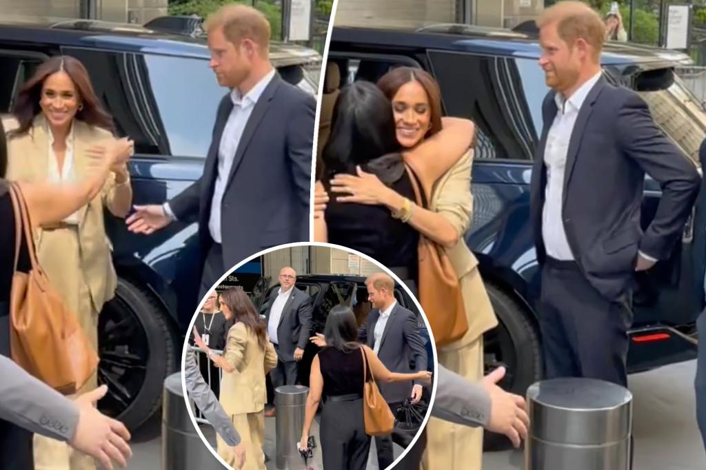 nypost's tweet photo. Watch Meghan Markle awkwardly leave ‘spare’ Prince Harry hanging in NYC crowd https://t.co/7wPK0mcLO9 https://t.co/cafBBgBScy
