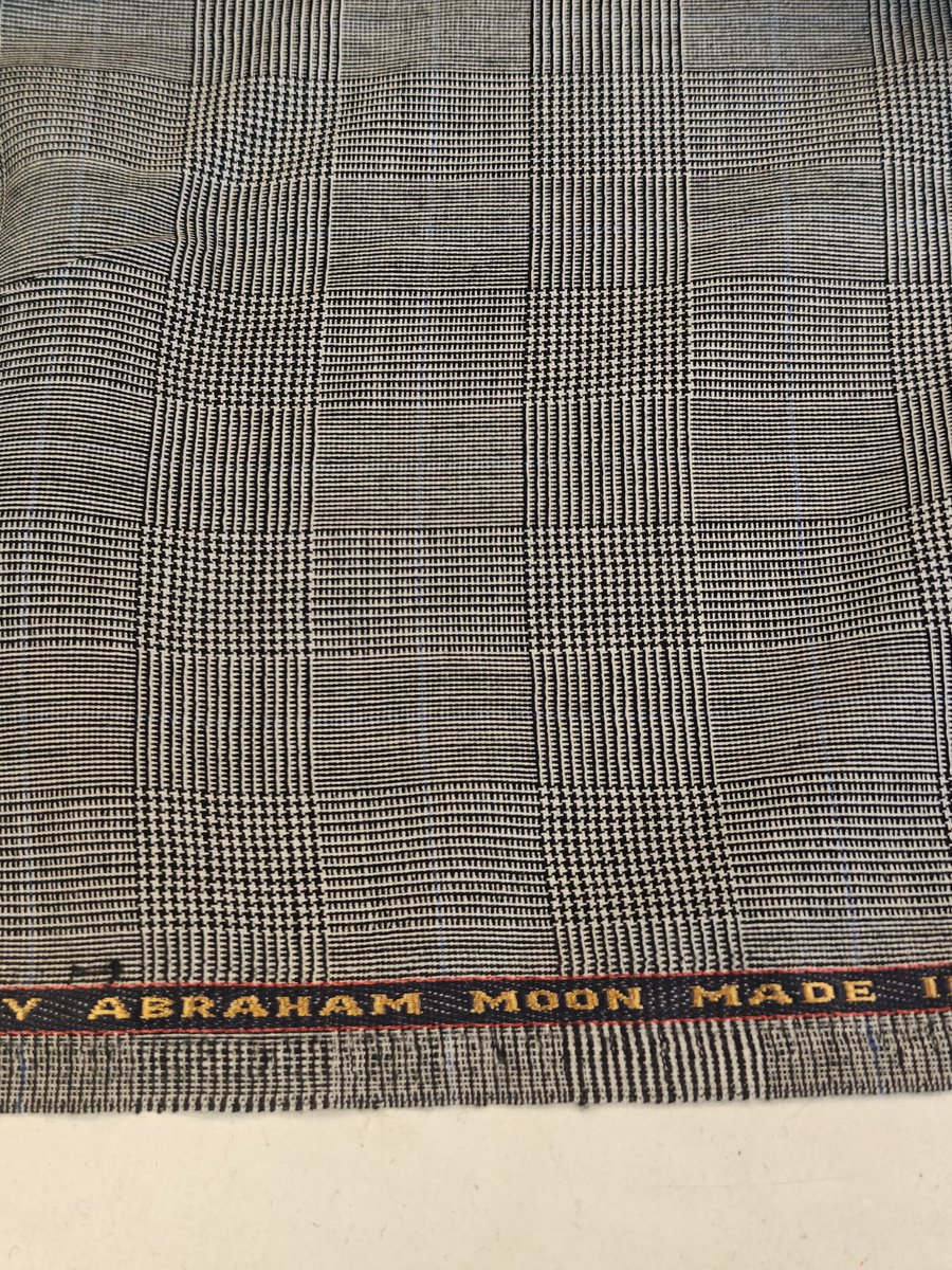 Glen Urquhart check. Better known as "Prince of Wales" check.
Popularised by King Edward VII &amp; VIII/Duke of Windsor. The best salesman Britain has ever had for tailoring &amp; style.
