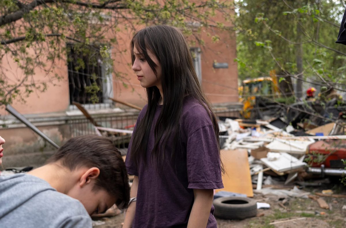 This morning, from 5 a.m., a group of teenagers waited anxiously for news about their friend, who was trapped under the rubble after a massive missile attack on Kyiv.

“We were all part of the same friend group. In the morning, we found out that the building where our friend