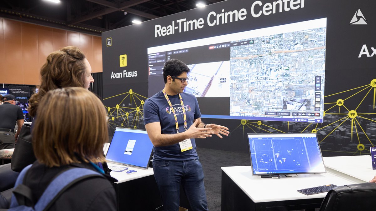 axon_enterprise's tweet photo. Real-time awareness is no longer an option — it’s a necessity.
Live from #AxonWeek25, we’re giving agencies a front-row seat to the future of real-time operations. From dispatch to resolution, agencies are experiencing how Axon Fusus is transforming Real-Time Crime Centers (RTCCs) into powerful hubs of connected intelligence.
Learn more: https://t.co/BScVY4bQk2
#RTCC #Axon #ProtectLife
