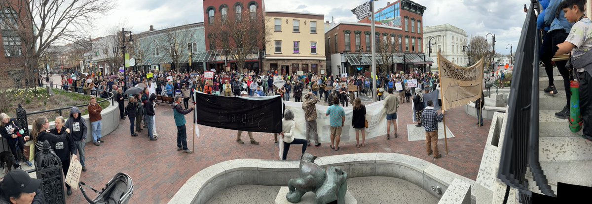 Emroy's tweet image. Vermonters protesting Border Patrol's apprehension of eight workers on a dairy farm.