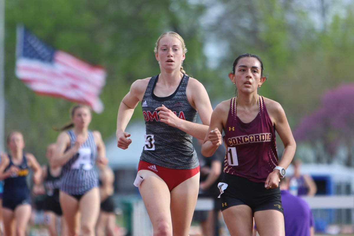 Izzy Apel of UNO wins her 5000 heat at Simpson College, America.