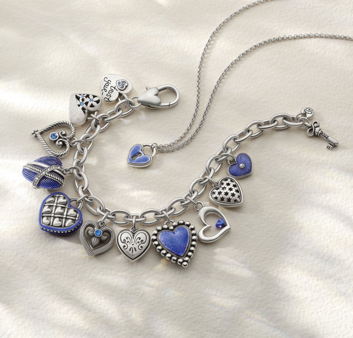 We’re all heart and loving every shade of blue 💙. The One Heart Collection puts a modern twist on classic hearts with the new One Heart Link Charm Bracelet, featuring blue enamel, mixed metals, and Swarovski accents. Wear it solo or stack it up — either way, it’s a standout.