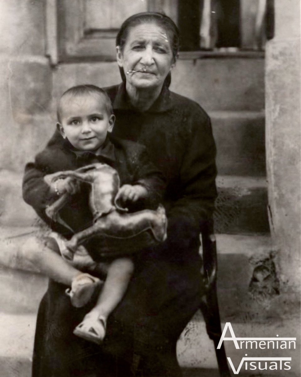 Armenian Genocide survivor Bersabe Vaivayan with her grandson, Beirut, circa 1950s.
