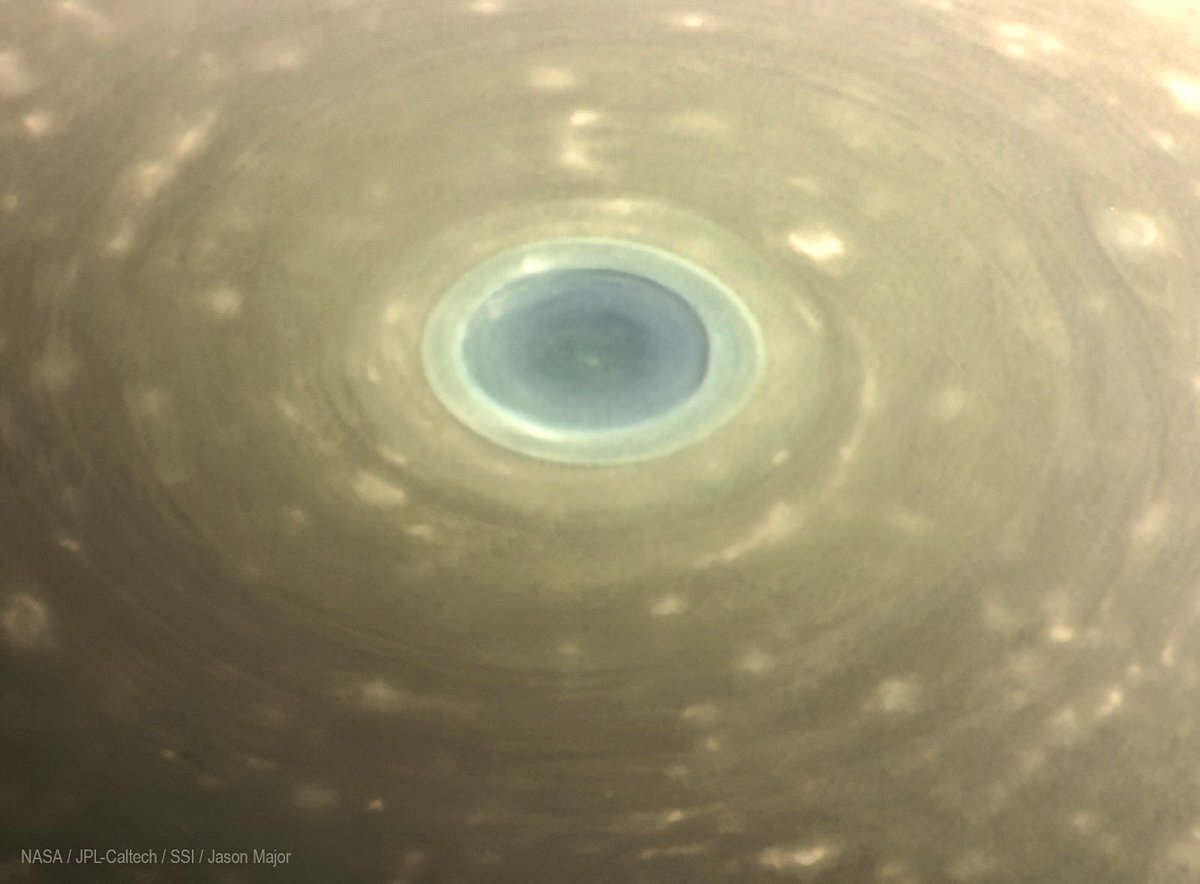 JPMajor's tweet photo. Captured by Cassini on April 24, 2017, this is a view of the blue-green eye of a permanent vortex spinning directly over Saturn’s north pole 🪐 https://t.co/7OeVdZTfTe