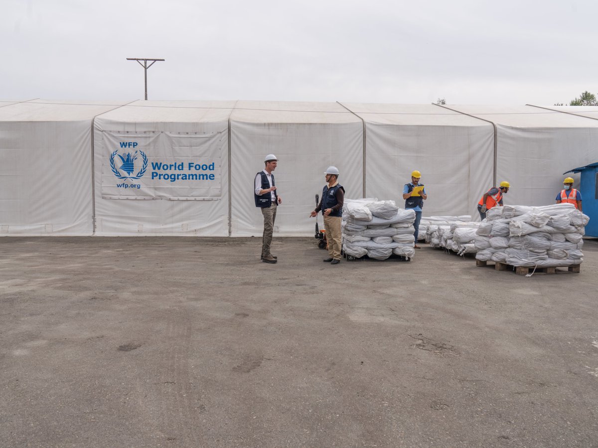 WFP_Nepal's tweet photo. Today marks ten years since the deadly earthquake in Nepal. 

@WFP provided logistics support to all humanitarian agencies. The Kathmandu Humanitarian Staging Area, which was just a month old then, enabled us to reach 2M+ people with emergency food &amp; nutrition within 6 weeks. https://t.co/Nl90ckQ0In