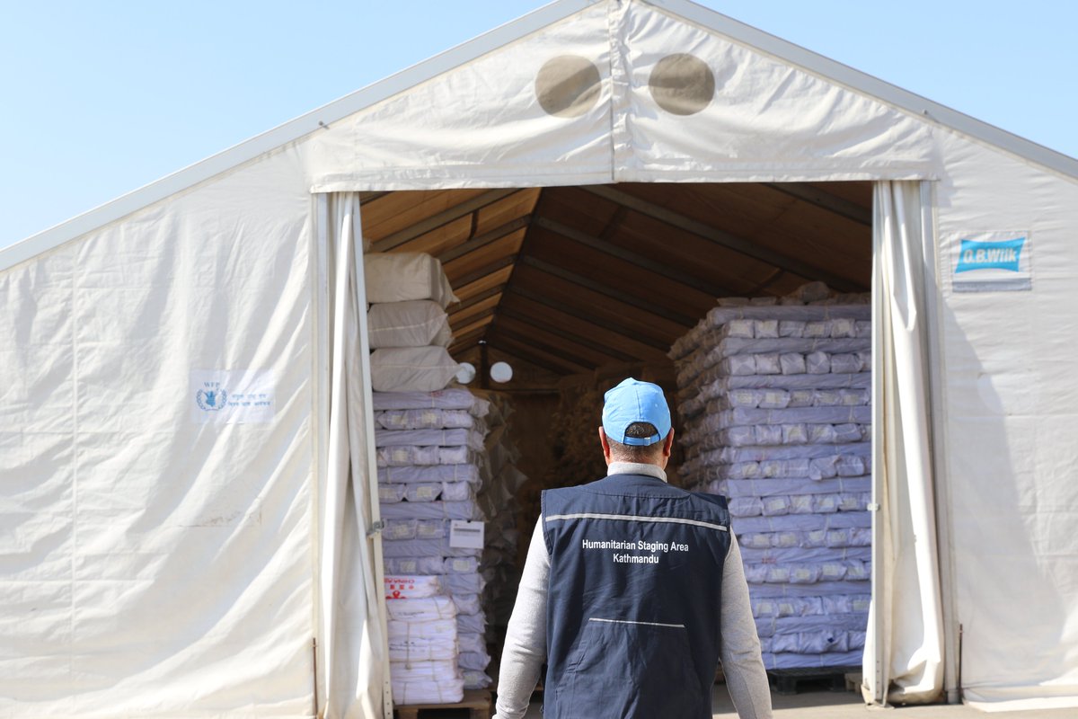 WFP_Nepal's tweet photo. Today marks ten years since the deadly earthquake in Nepal. 

@WFP provided logistics support to all humanitarian agencies. The Kathmandu Humanitarian Staging Area, which was just a month old then, enabled us to reach 2M+ people with emergency food &amp; nutrition within 6 weeks. https://t.co/Nl90ckQ0In