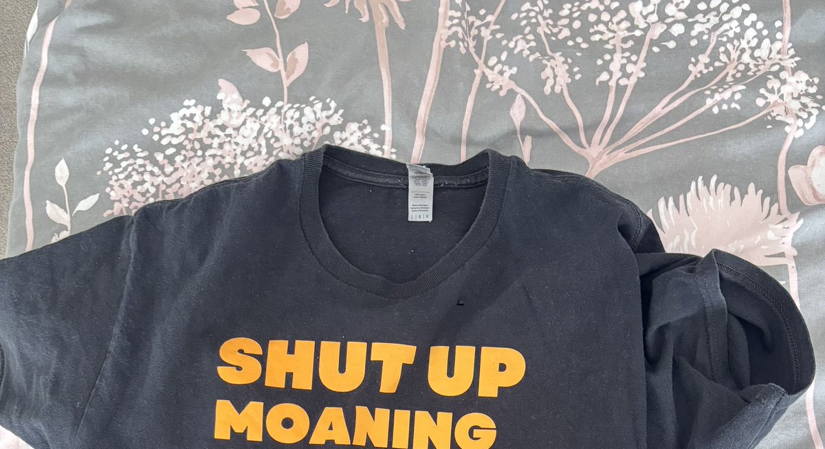 jodders19's tweet photo. @TherosadocsUK This is the only part of this T Shirt you can see on a Teams call apparently 😬 https://t.co/McQkPslZme
