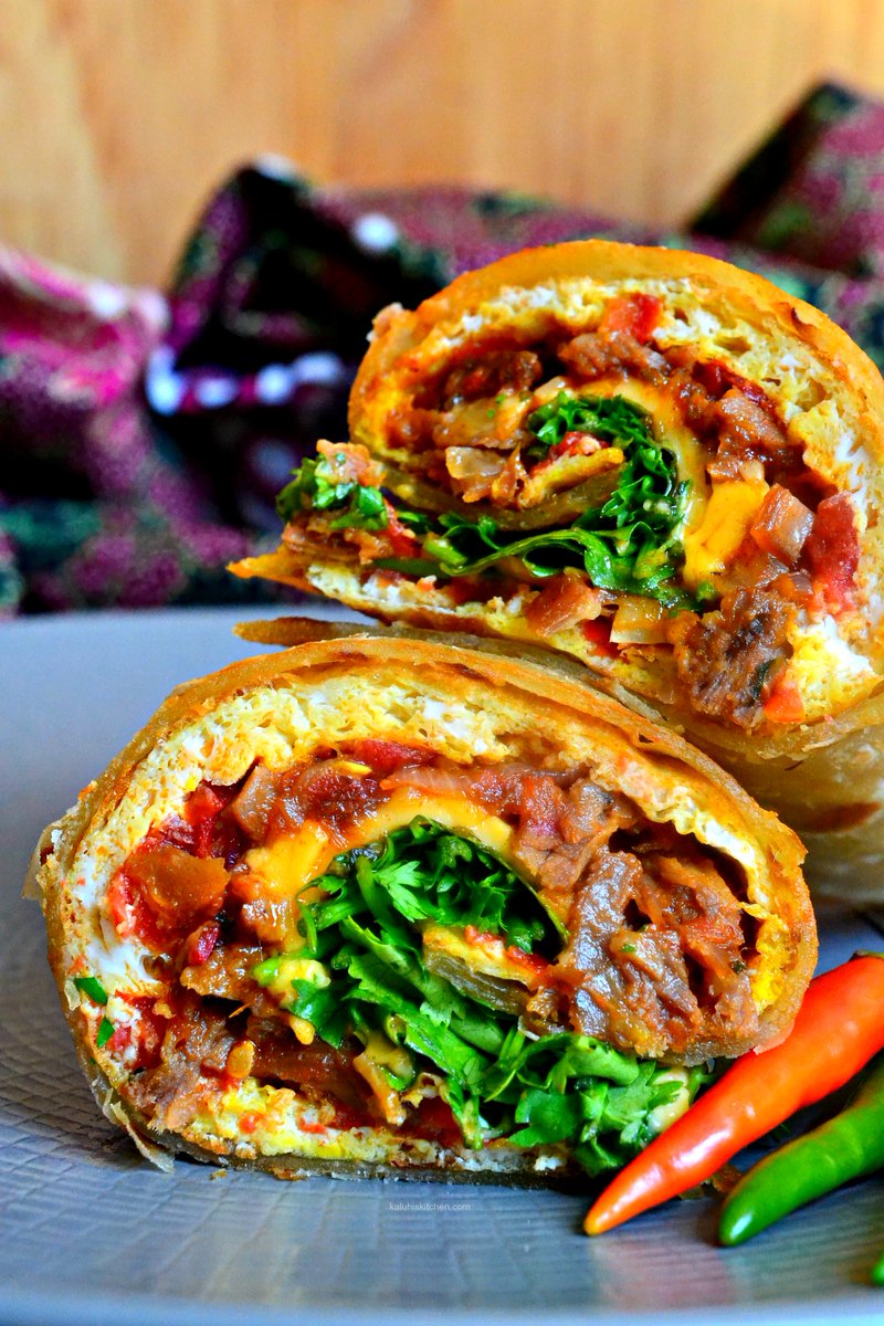 IzySmokes's tweet image. "Nothing beats a hot Rolex fresh off the street stall!  What's your go to spot for the ultimate Ugandan Rolex experience? Drop it below! 
#UgandaVibes #RolexLovers"