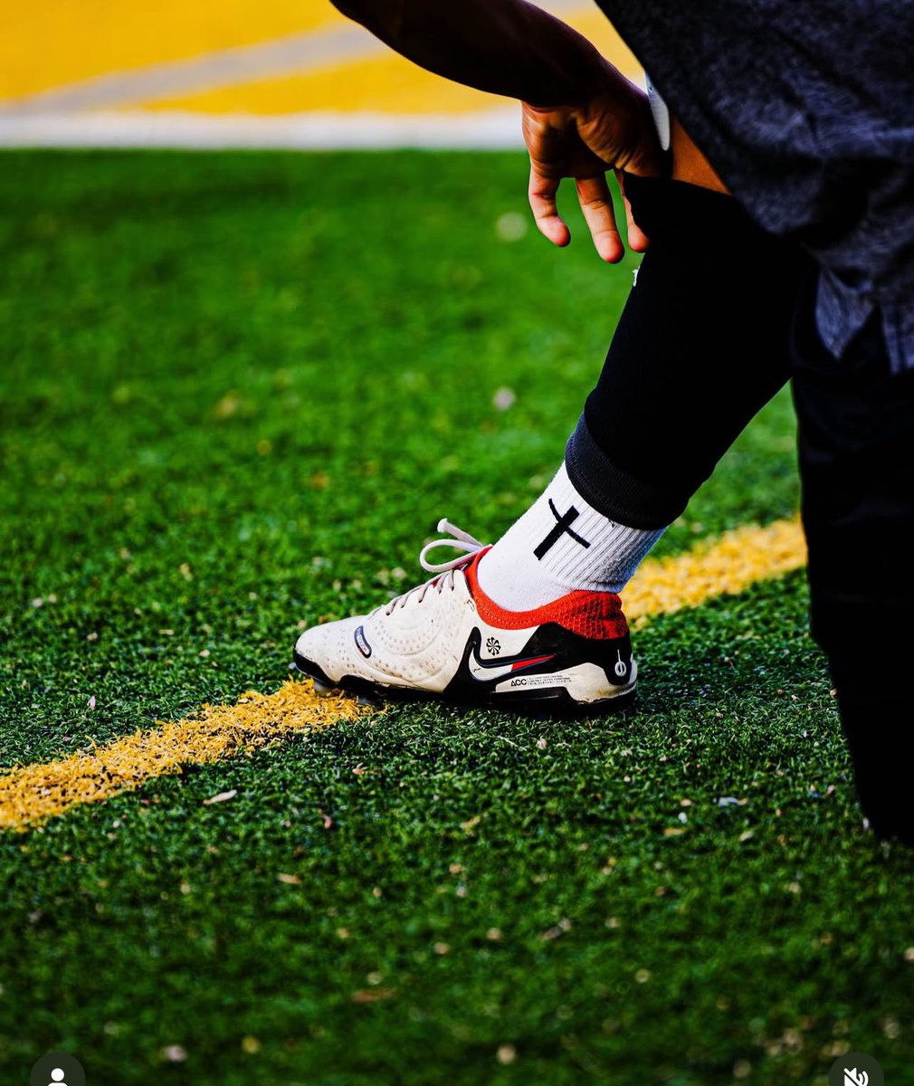 LB boys varsity soccer player getting ready to take the field!