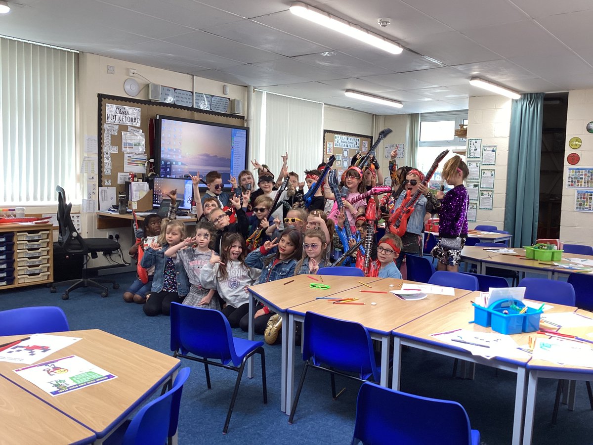 ROCK ON! We have had a brilliant day dressing up as rock stars and practising our times tables. There have been lots of games and competitions between the classes.
