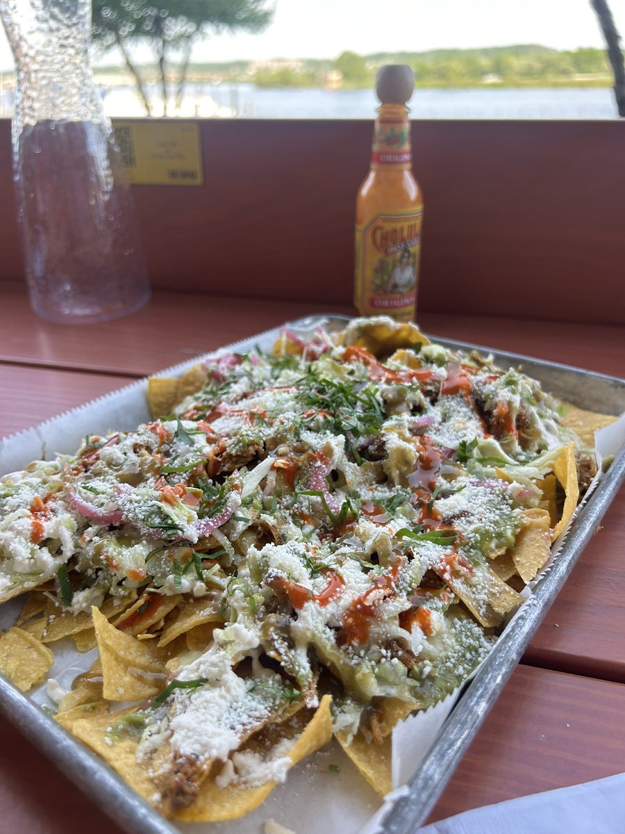 Highly recommend sheet pan happy hour nachos at El Rey before a ball game. These were $10 + $3 to add pork.  Delicious!