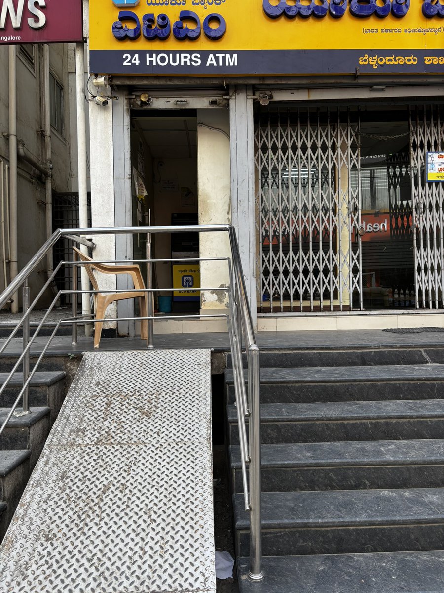 If you are a disabled person just come up the ramp and jump over the railing . 

- Outside UCO bank in Bangalore.