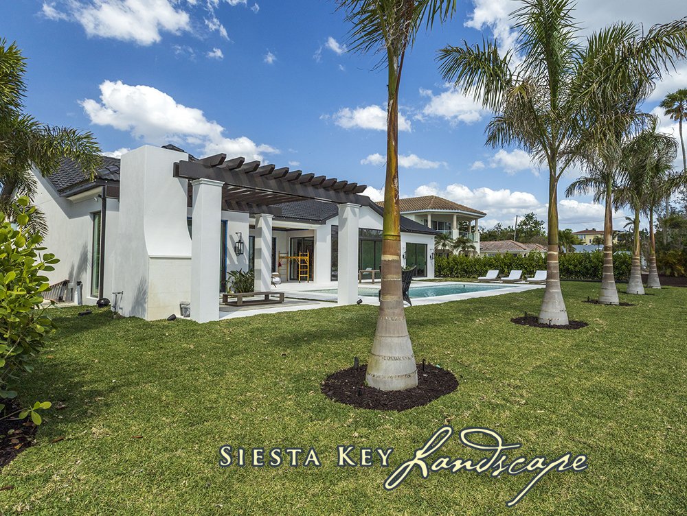 SK_Landscape's tweet photo. #SiestaKey #Landscape had the pleasure of collaborating with a homeowner to create a grand estate entrance that would match the elegance of their interior renovations. Click https://t.co/ua62YpaWDY for project details and a link to the stunning photos. #Sarasota #Landsacaping https://t.co/DbUVQvvPms