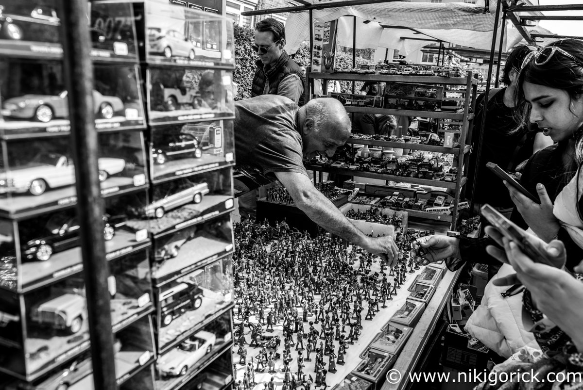 nikigorick's tweet image. #Portobello #Trader Many changes at the #market but 25 years on, great to see this #stallholder still doing a roaring trade - a little older but no less enthusiastic. 
#londonthenandnow #londonlife #photography #london #toys @Londonist @LDN_Museum @VanishedLondon