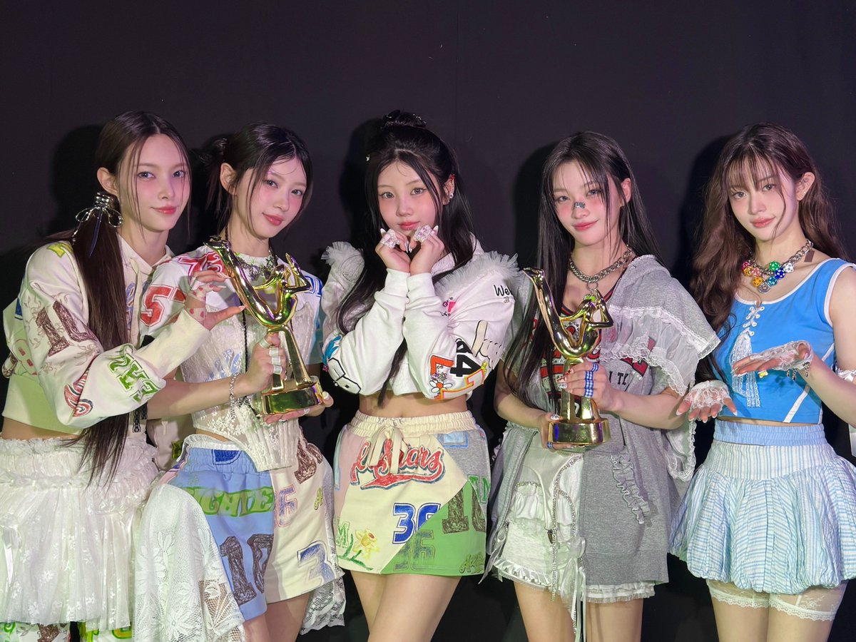 minsju's tweet image. happy to see these awards sticked: out! 🥇 a verily proudest—group photo after we brought home awards. trapped in so much happiness; let's cheer for latest golden disc awards. 🩵