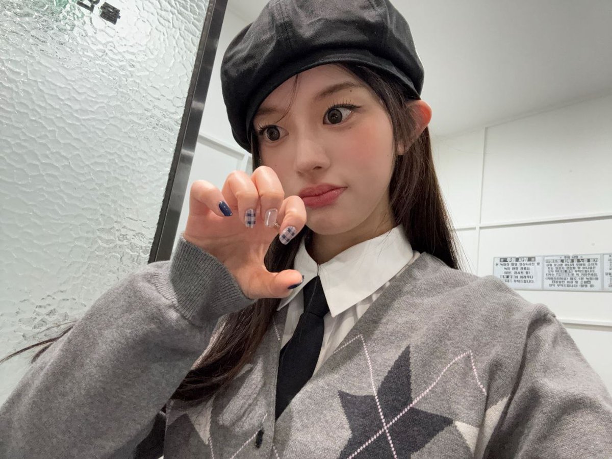 minsju's tweet image. loving gray lately. 🩶💬 a day feels brighter, i turn to gray, instead. my main topic for today is just the nails that are so well-done and beret that has been completing my fits. it's just a gaze ... and the wink!