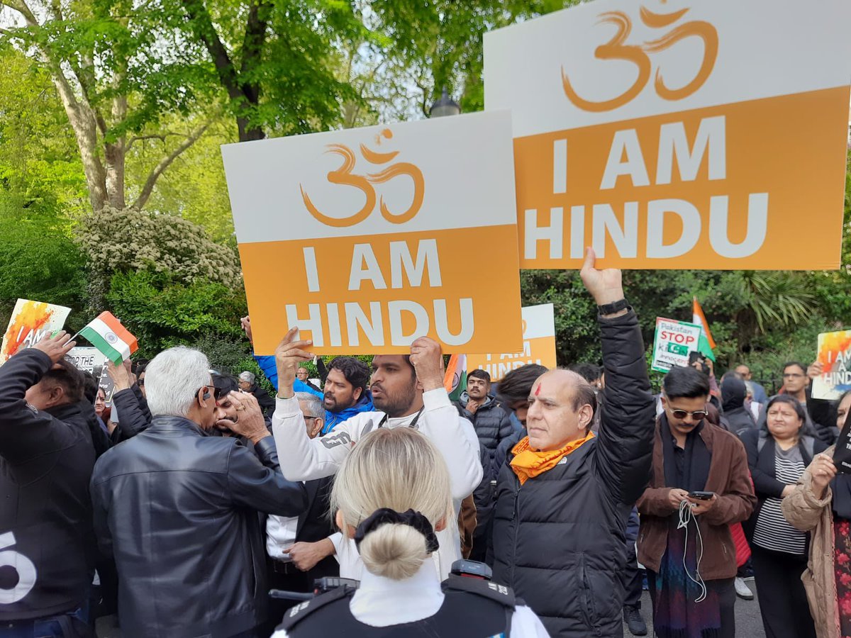 AdityaRajKaul's tweet photo. #BREAKING: Indian Diaspora turns out in large numbers outside Pakistani High Commission in London to protest against Pakistan sponsored terror attack in Pahalgam of Jammu &amp; Kashmir which killed 26 civilians. Pakistani ISI agents keeping a watch and recording videos. #IAMHINDU 🕉️ https://t.co/0UKb83qAGb