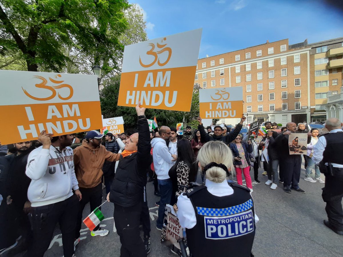 AdityaRajKaul's tweet photo. #BREAKING: Indian Diaspora turns out in large numbers outside Pakistani High Commission in London to protest against Pakistan sponsored terror attack in Pahalgam of Jammu &amp; Kashmir which killed 26 civilians. Pakistani ISI agents keeping a watch and recording videos. #IAMHINDU 🕉️ https://t.co/0UKb83qAGb