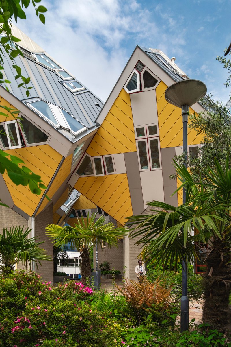 deimian5's tweet photo. The Kubuswoning, or cube houses, are a group of innovative houses designed by architect Piet Blom in 1984 and built on Overblaak Street in Rotterdam. Blom rotated the conventional cube of a house 45° and placed it on hexagonal pillars. There are 32 cubes in total. https://t.co/KKoU6Bg4UQ