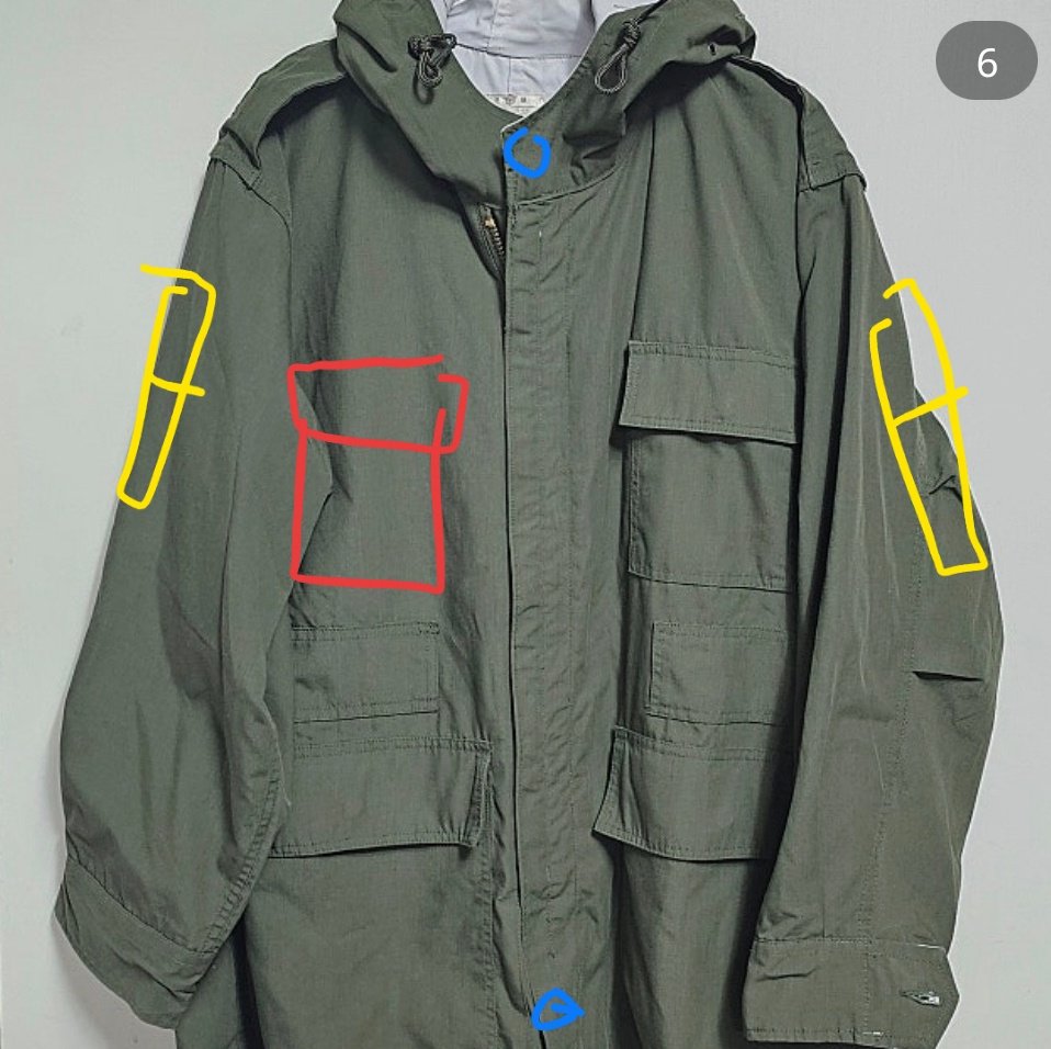 The character in the picture is wearing a modified version that is different from the real one, so I bought 2 sets of clothes and asked them to move the chest pocket and put new pockets on the arms.

I can't wait for it to be finished!