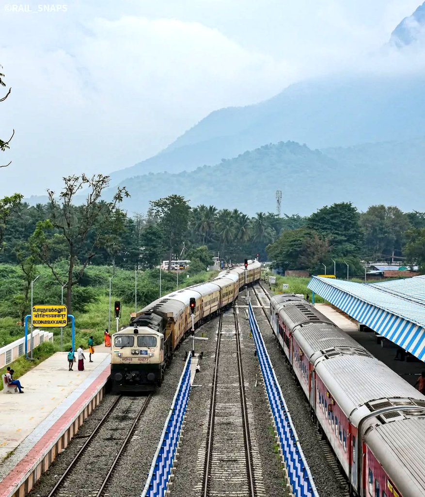 Ananth Rupanagudi (@ananth_iras) on Twitter photo Yet another beautiful capture of the beautiful location amidst the greenery and the Ghats in the background, of Bodinayakannur station, in the jurisdiction of <a href="/drmmadurai/">DRM MADURAI</a> in <a href="/GMSRailway/">Southern Railway</a>! Pic courtesy, Shrivathsan! #IndianRailways #photography <a href="/BalakrishnanR/">R. Balakrishnan</a> <a href="/latasrinivasan/">Latha Srinivasan</a> Yet another beautiful capture of the beautiful location amidst the greenery and the Ghats in the background, of Bodinayakannur station, in the jurisdiction of <a href="/drmmadurai/">DRM MADURAI</a> in <a href="/GMSRailway/">Southern Railway</a>! Pic courtesy, Shrivathsan! #IndianRailways #photography <a href="/BalakrishnanR/">R. Balakrishnan</a> <a href="/latasrinivasan/">Latha Srinivasan</a>