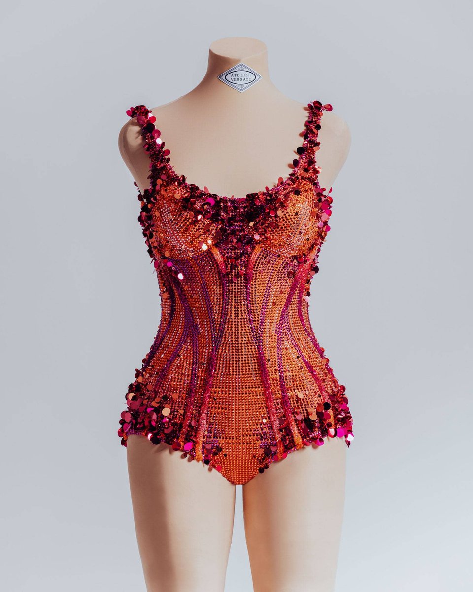 Enough time has passed for you divas to acquire some taste and acknowledge that this was the prettiest bodysuit combo