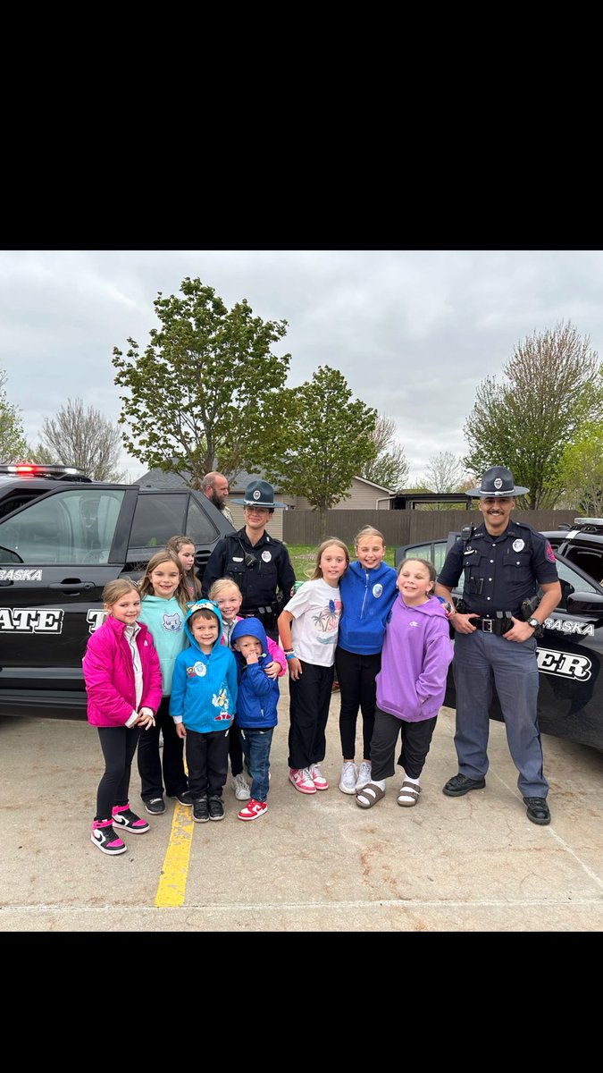 NSP_TroopH's tweet photo. Troopers Ali #NSP229 and Ligenza #NSP297 were out at Wysong Elementary tonight showing these future troopers our patrol vehicles and answering questions. https://t.co/8YGeC4eRCY