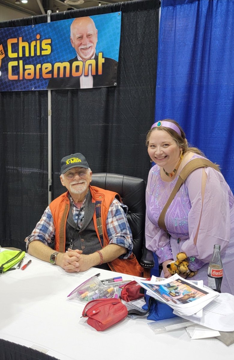 CandyholicJess's tweet photo. I met someone today that I never expected. 

This is Chris Claremont, the creator of the X-Men INCLUDING my beloved and obsessed Emma Frost. We had a wonderful conversation about origin, Scott Summers, politics, climate control. It was pure joy and fixed point for my life. https://t.co/g0YU8dhRZd